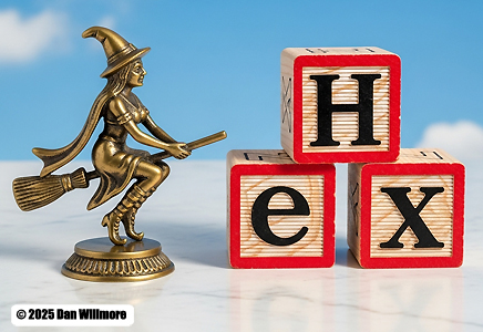 Picture of a witch with ABC blocks that spell the word "HEX."